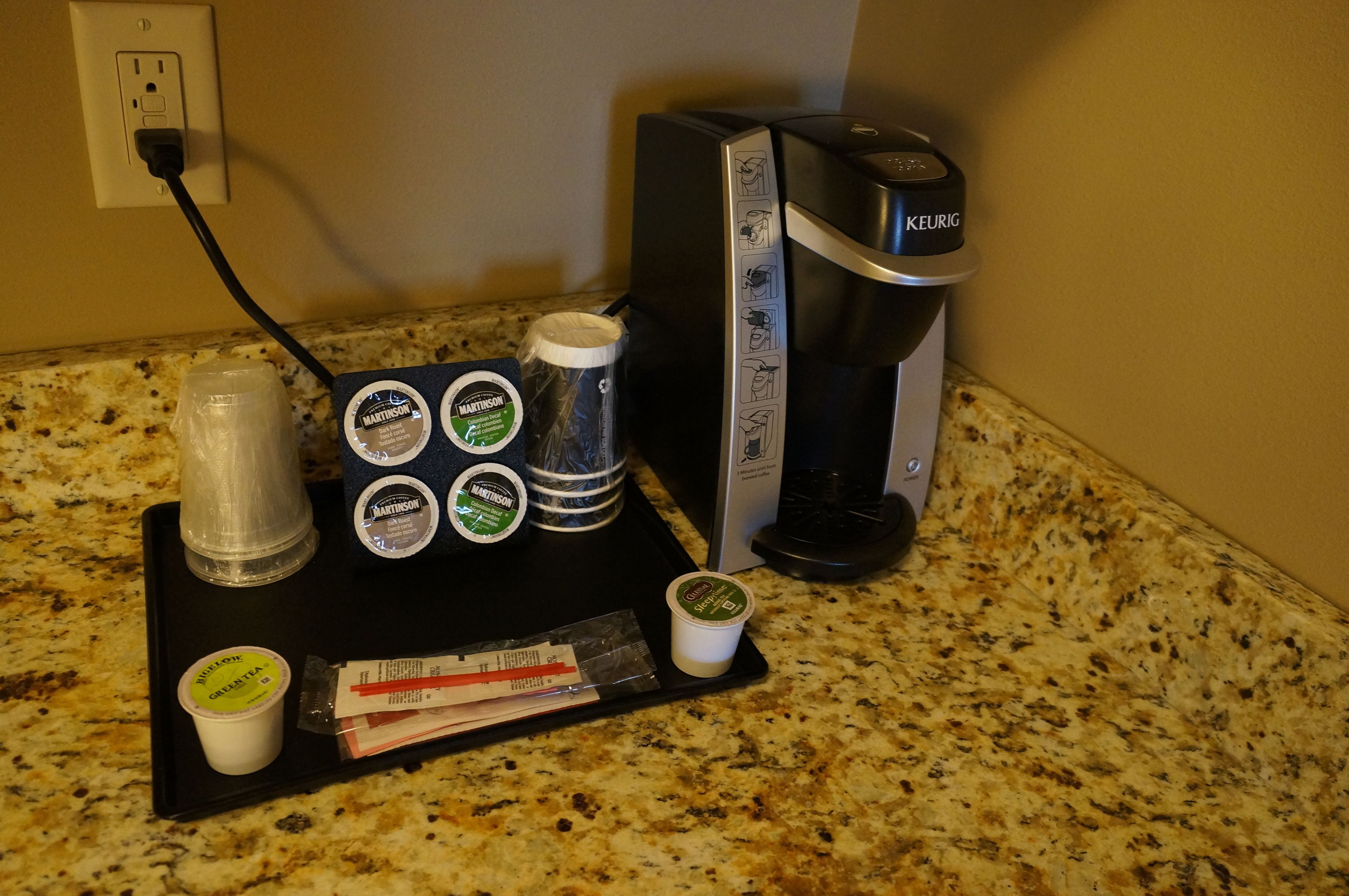 hypo-allergenic bedding, desk, laptop workspace, blackout curtains