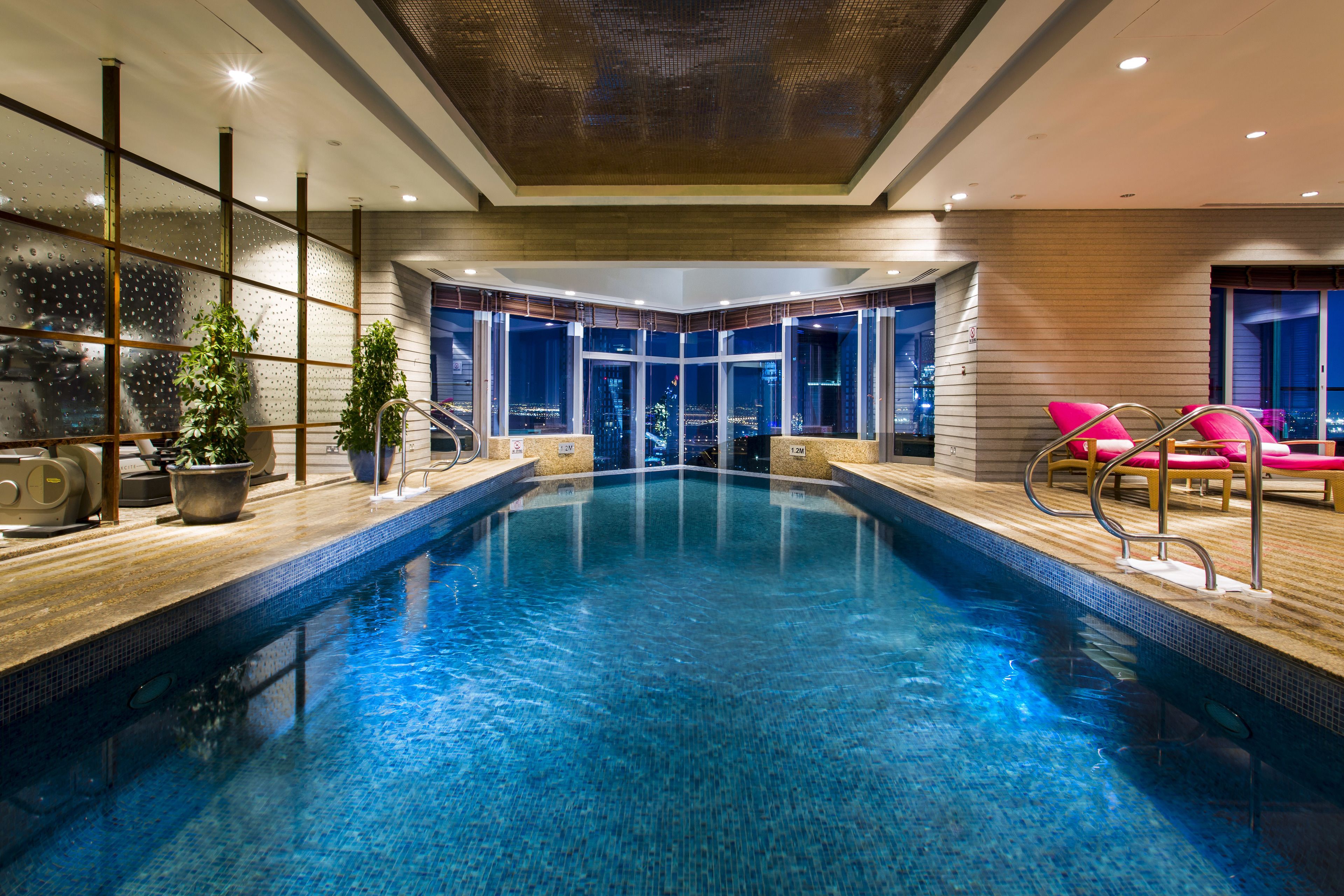 indoor pool, outdoor pool, pool loungers