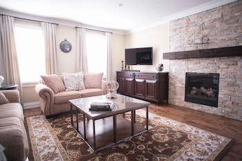 Pillowtop beds, in-room safe, desk, laptop workspace at 124 on Queen Hotel & Spa