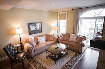 Pillowtop beds, in-room safe, desk, laptop workspace at 124 on Queen Hotel & Spa