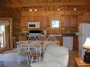 Deluxe Cabin, 3 Bedrooms (White Lightning) | Private kitchen | Fridge, microwave, stovetop, dishwasher