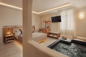Chambre supérieure, baignoire à jets | Literie de qualité, coffre-fort, décor unique, ameublement unique