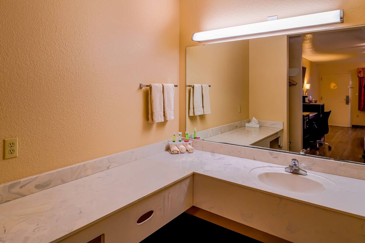 room (2 king beds) | bathroom | free toiletries, hair dryer, towels, toilet paper