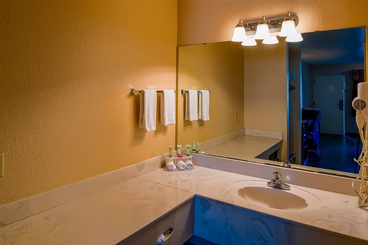 free toiletries, hair dryer, towels, toilet paper