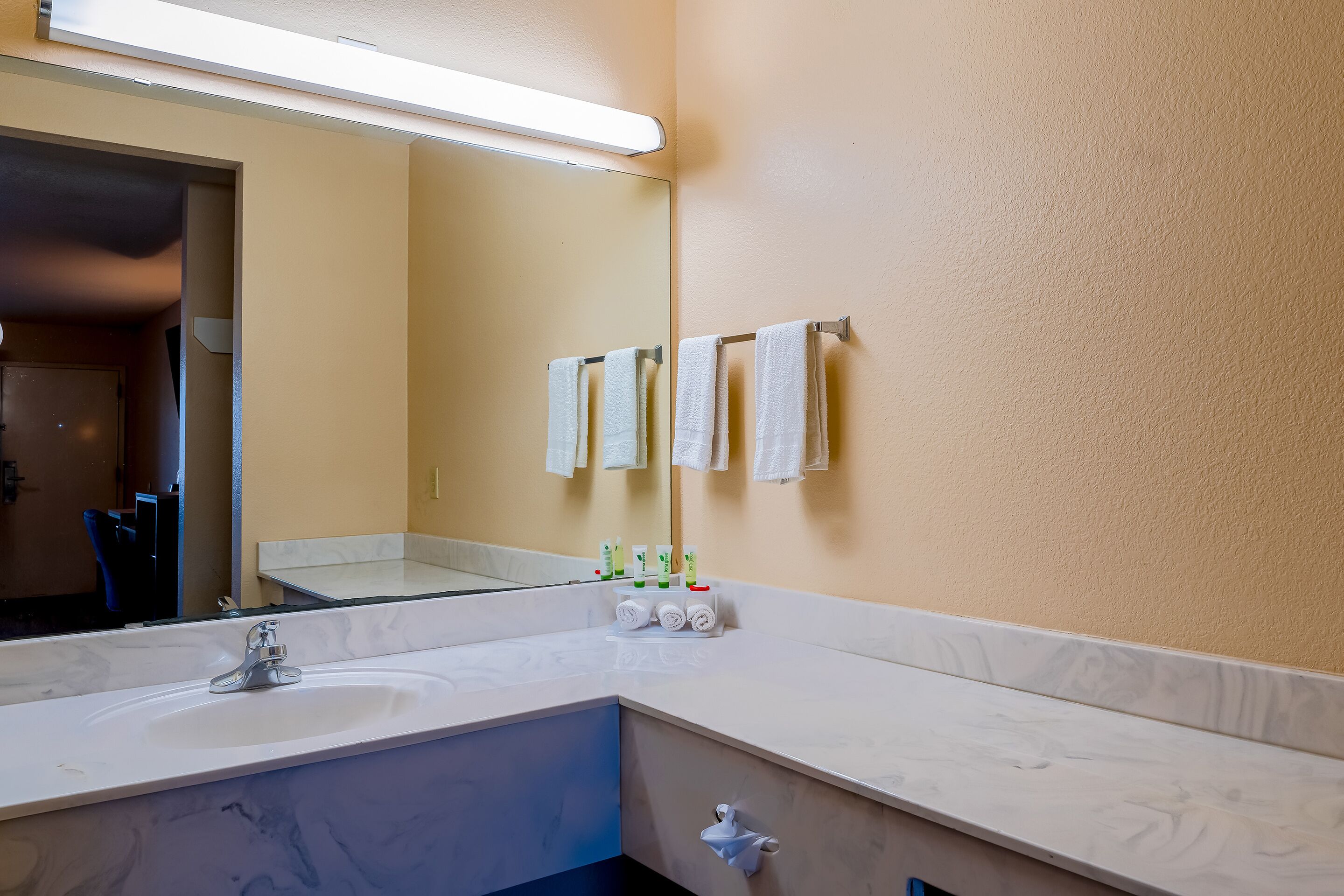 free toiletries, hair dryer, towels, toilet paper