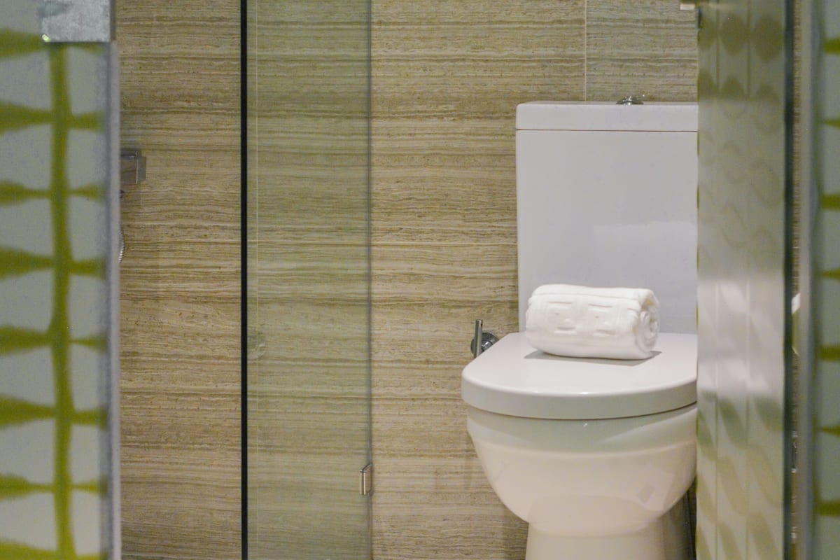 standard room | bathroom | shower, free toiletries, hair dryer, bathrobes