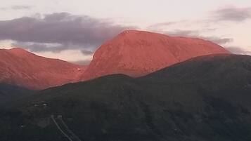 A mountain landscape with a clear sky.