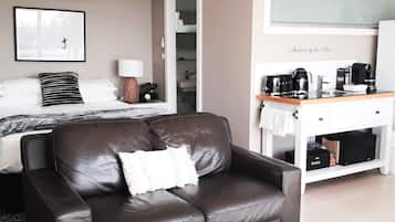 Premium bedding, pillowtop beds, laptop workspace, blackout drapes