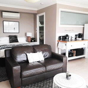 Premium bedding, pillow-top beds, laptop workspace, blackout curtains