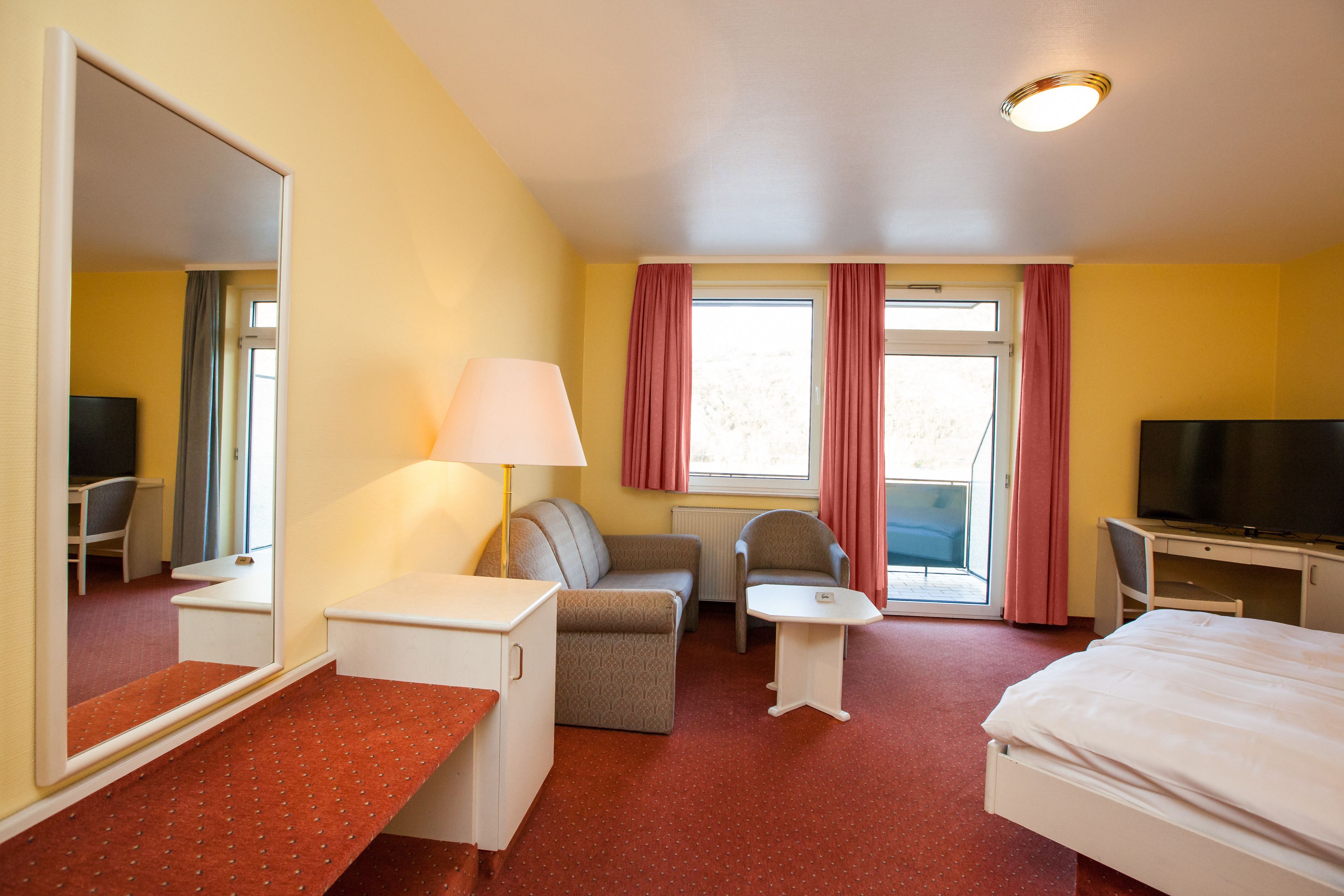 comfort double room, balcony, river view | room amenity