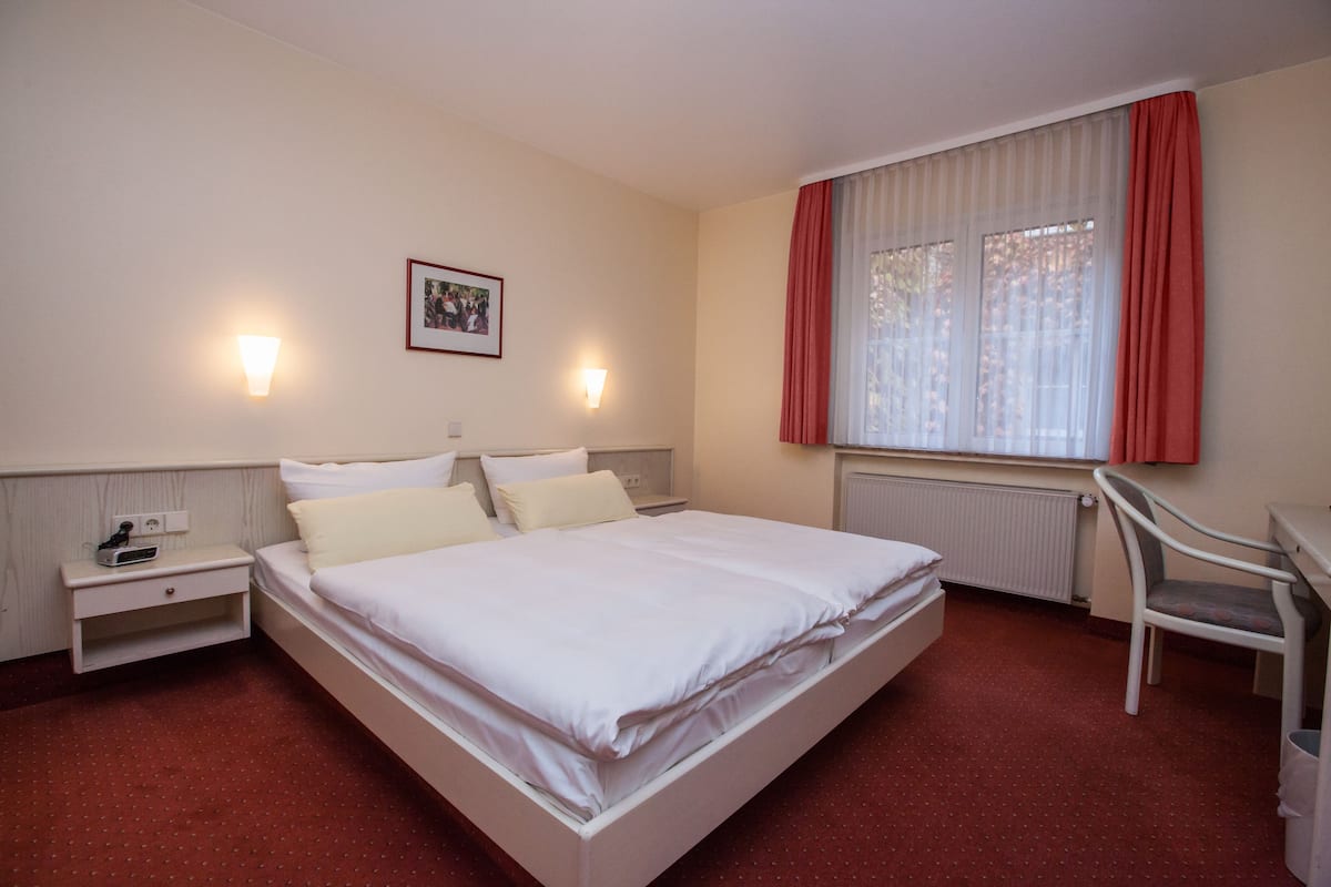 Comfort Double Room, Courtyard Area | Hypo-allergenic bedding, in-room safe, desk, iron/ironing board