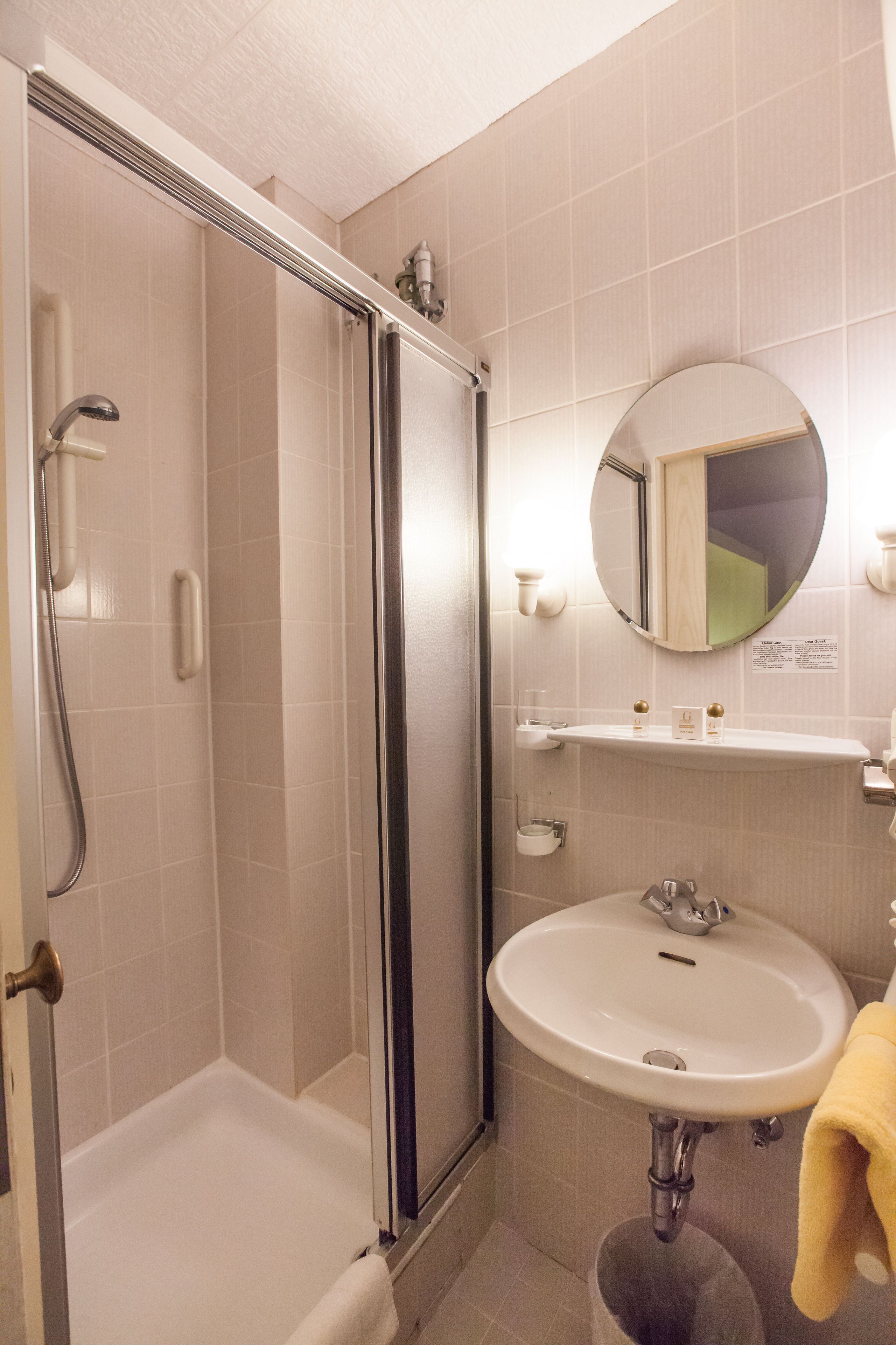 economy double room, courtyard area | bathroom | free toiletries, hair dryer, towels