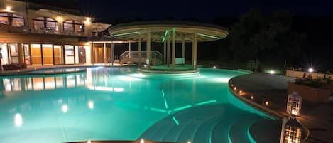 Seasonal outdoor pool, pool umbrellas, pool loungers
