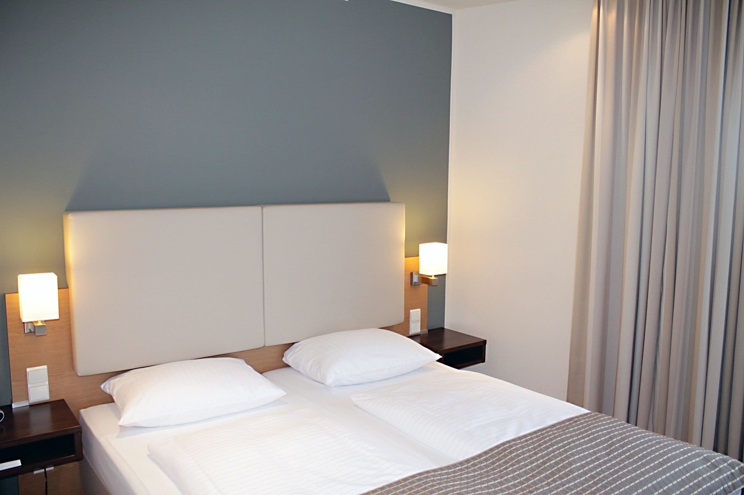 standard double room | in-room safe, individually decorated, blackout curtains, free wifi
