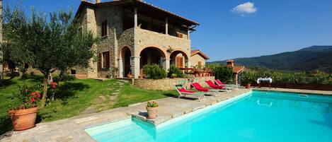 Outdoor pool, pool umbrellas, sun loungers