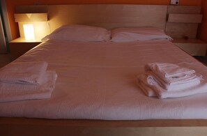 Desk, free cots/infant beds, rollaway beds, bed sheets