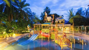 A water park with a slide, play structures, and a pool area. - The Greenery Resort Khao Yai (Pak Chong)