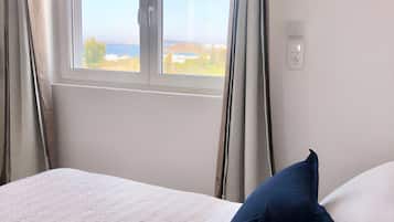 Deluxe Studio | Premium bedding, down comforters, memory foam beds, in-room safe