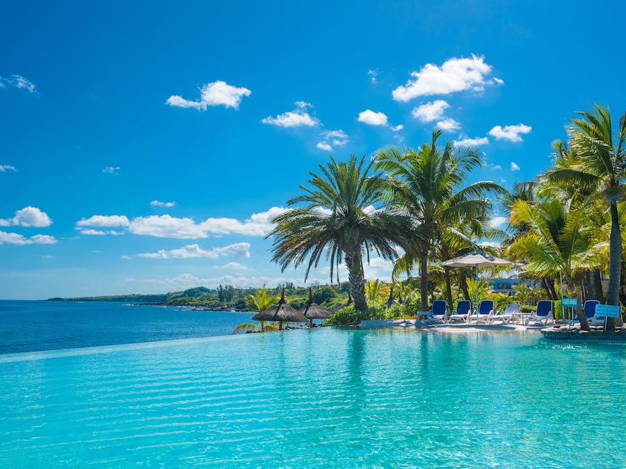 2 outdoor pools, pool umbrellas, pool loungers