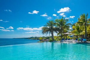 2 outdoor pools, pool umbrellas, sun loungers