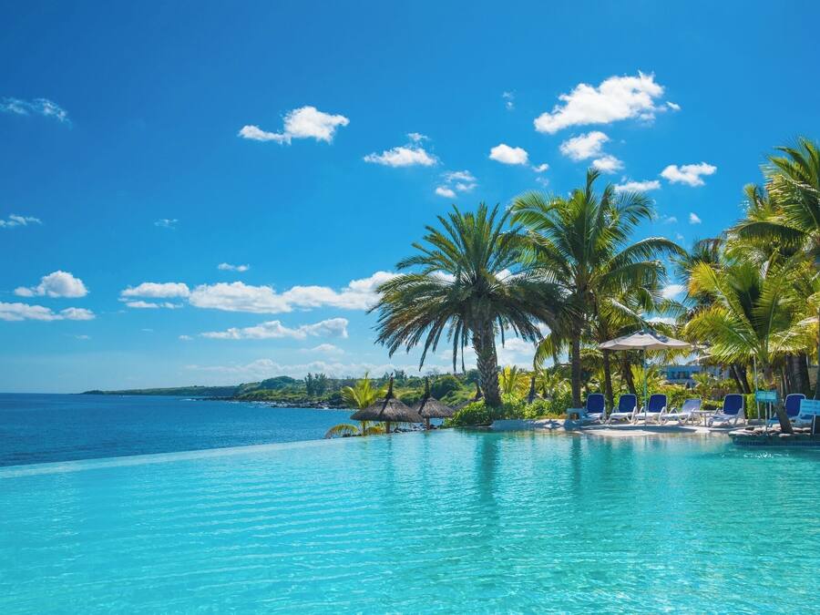 2 outdoor pools, pool umbrellas, sun loungers