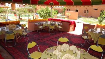 Breakfast, lunch, dinner served; local cuisine