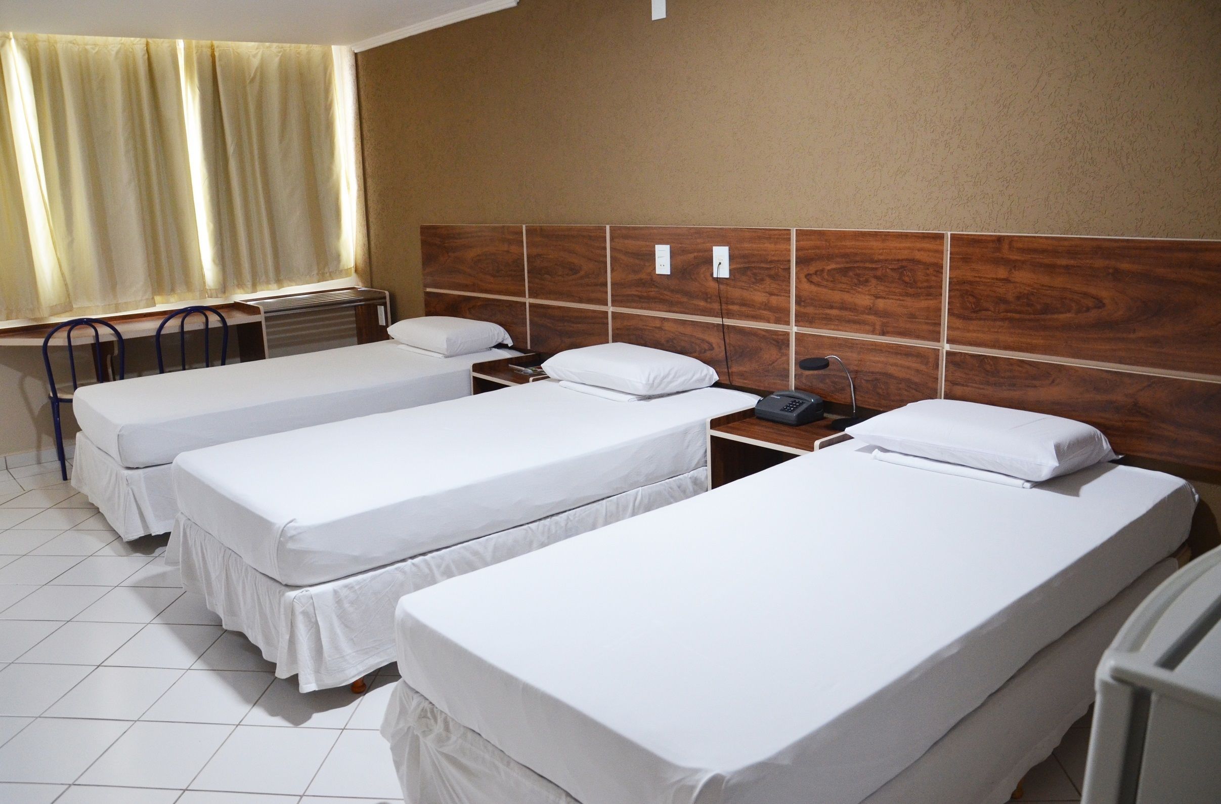 deluxe triple room | bathroom | shower, free toiletries