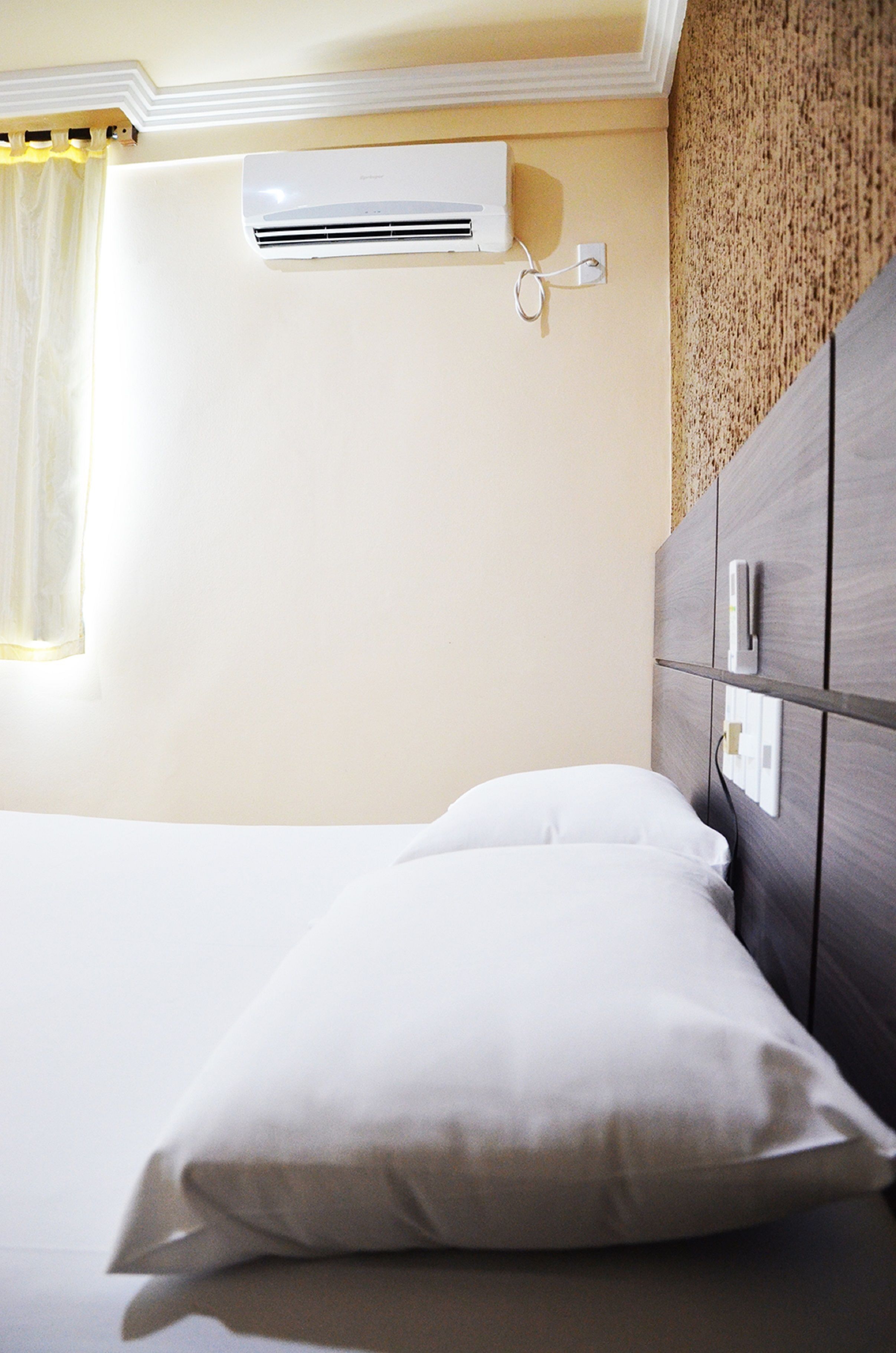 deluxe double room, 1 queen bed, private bathroom | minibar, desk, free wifi