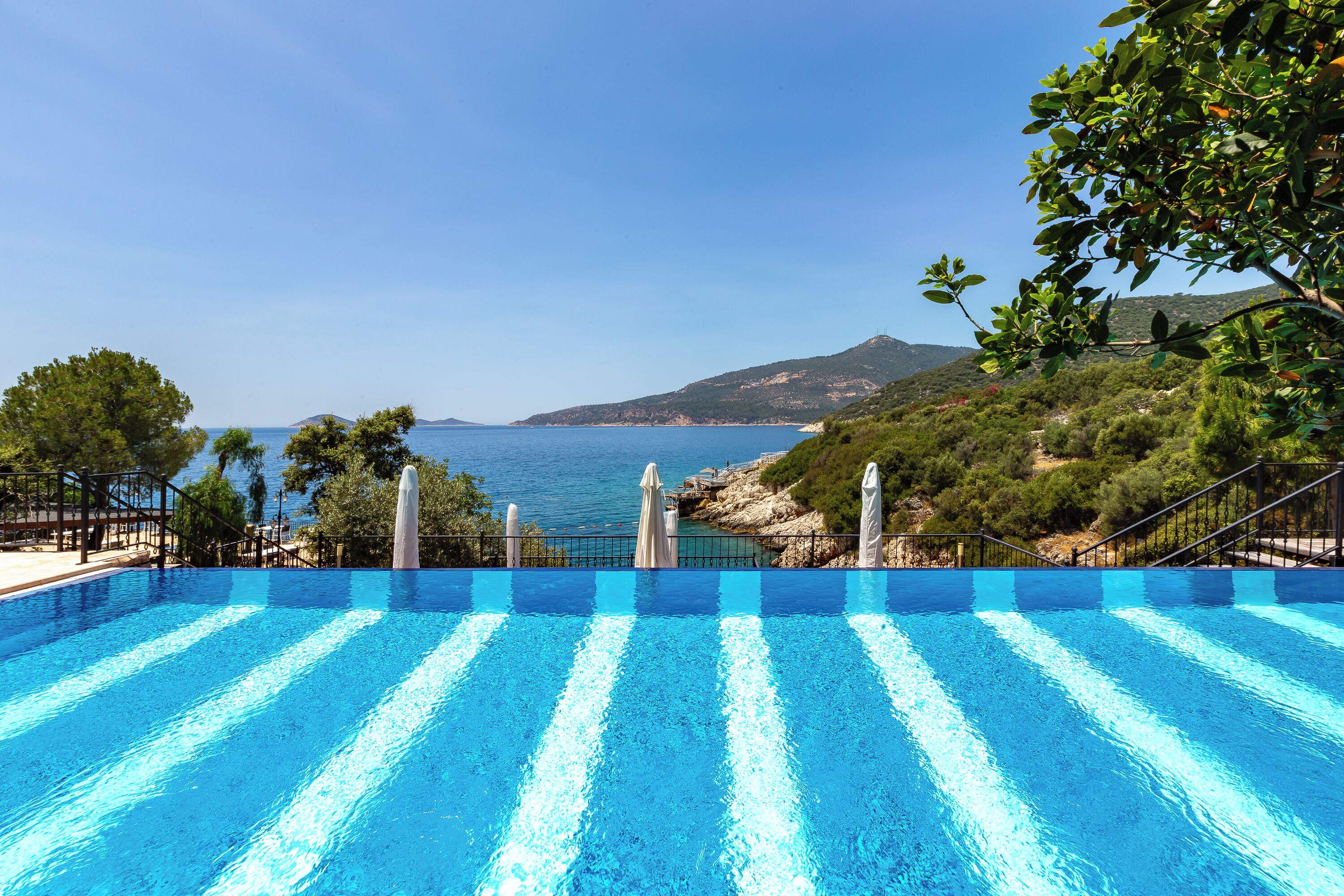 3 outdoor pools, open 8:30 AM to 8:00 PM, pool umbrellas, pool loungers