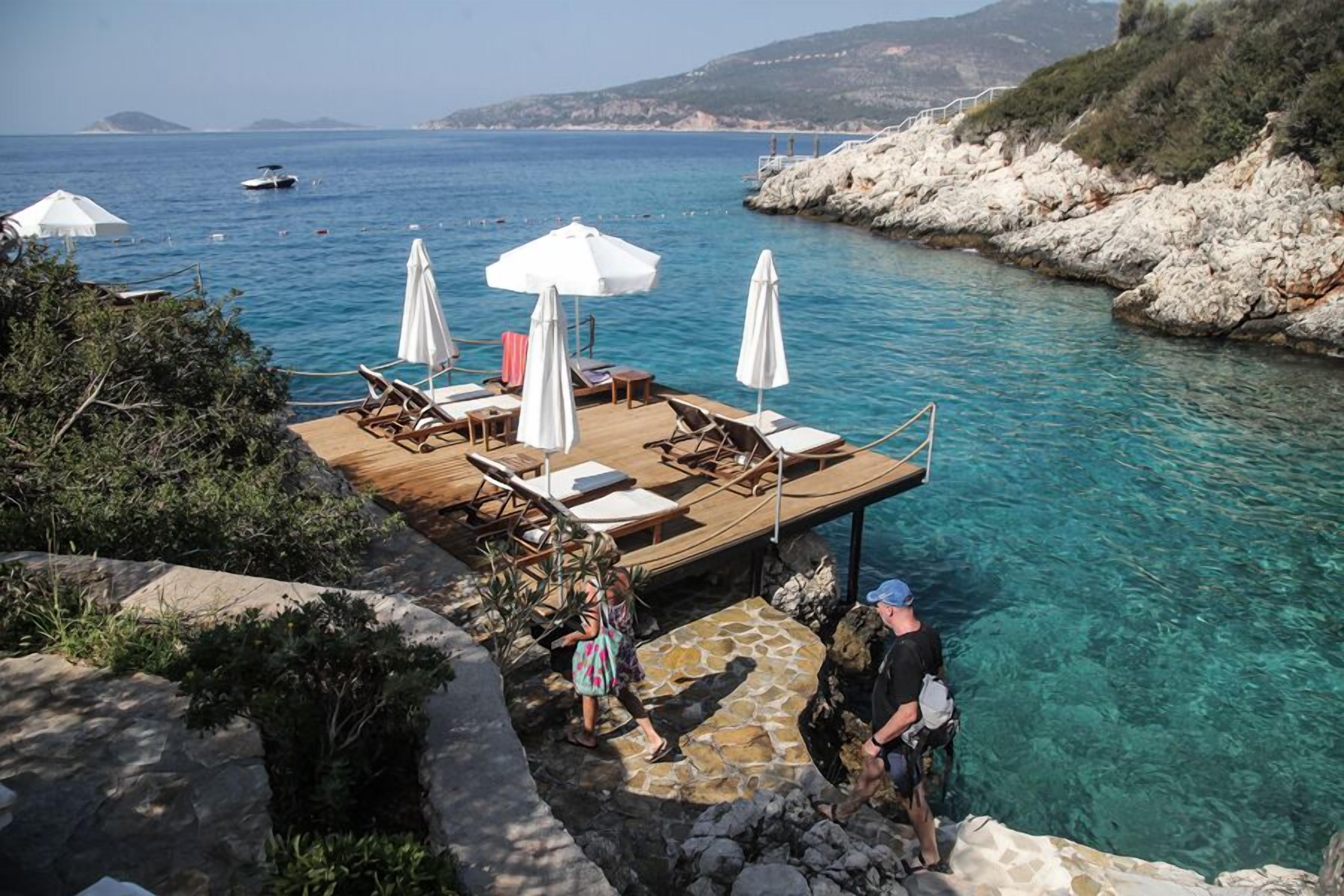 private beach, free beach cabanas, sun-loungers, beach umbrellas