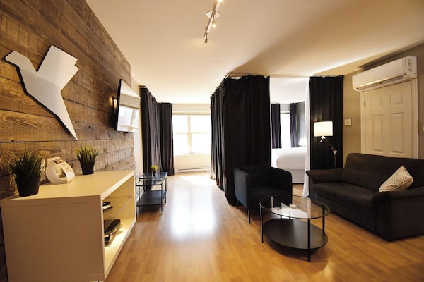 Bower on Lester Two Bedroom | Living area | Flat-screen TV