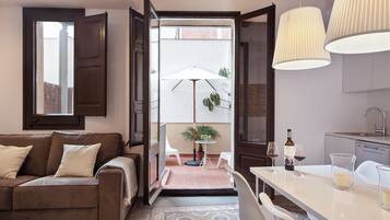 Apartment, 2 Bedrooms | Living area | Flat-screen TV
