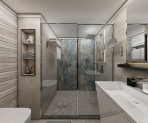 Ein modernes Badezimmer mit einer Duschkabine, einem weißen Waschbecken und einem Spiegel.