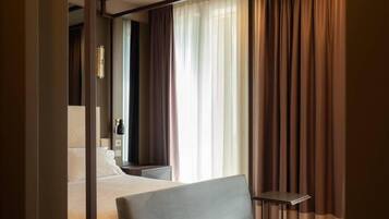 Suite, 1 King Bed | Minibar, in-room safe, iron/ironing board, free WiFi
