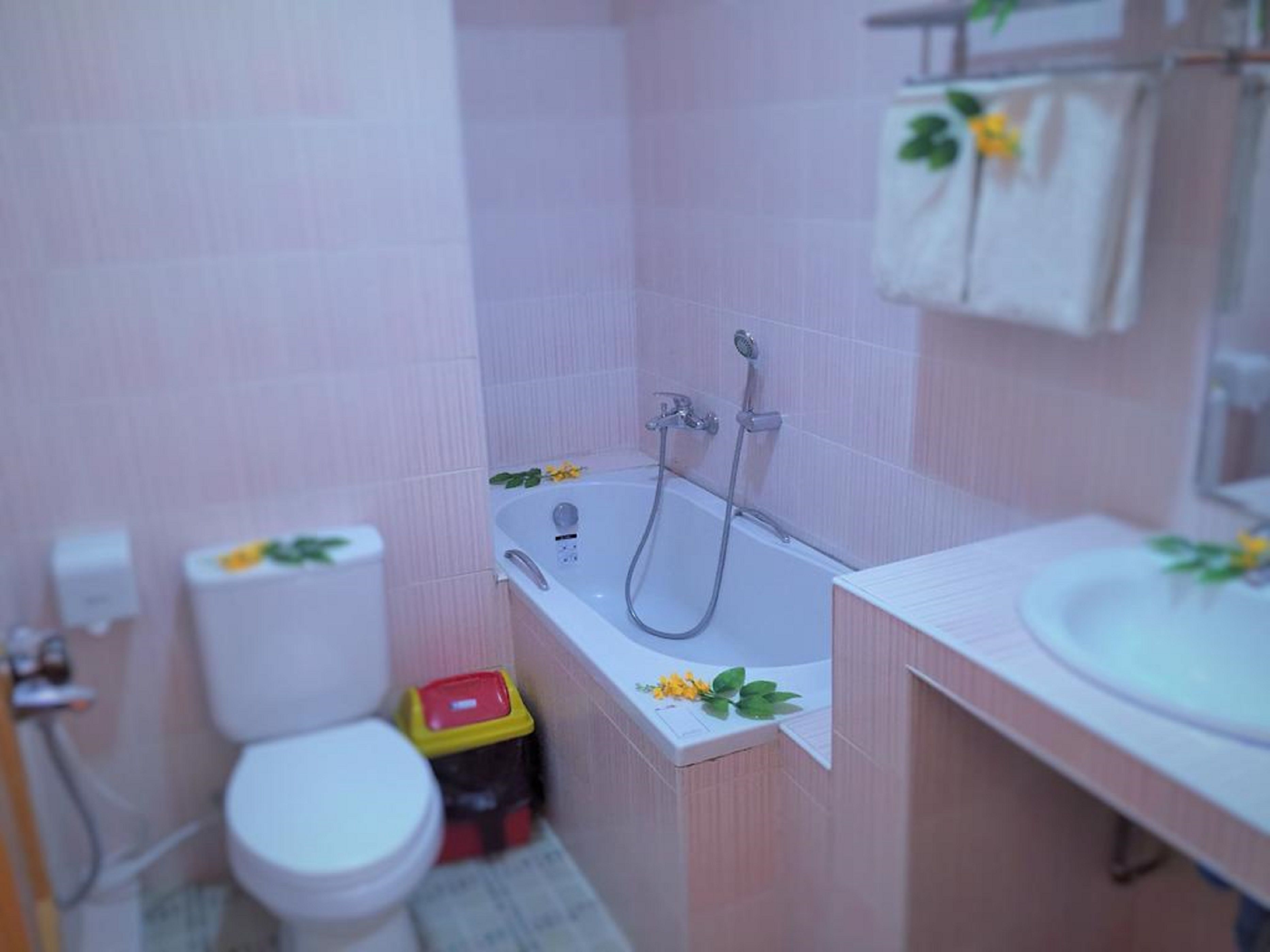 superior triple room | bathroom | free toiletries, hair dryer, slippers, towels