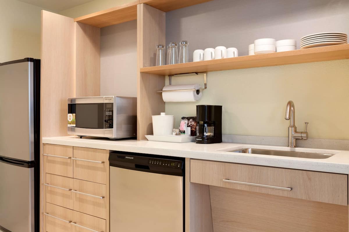 premium bedding, desk, laptop workspace, blackout curtains