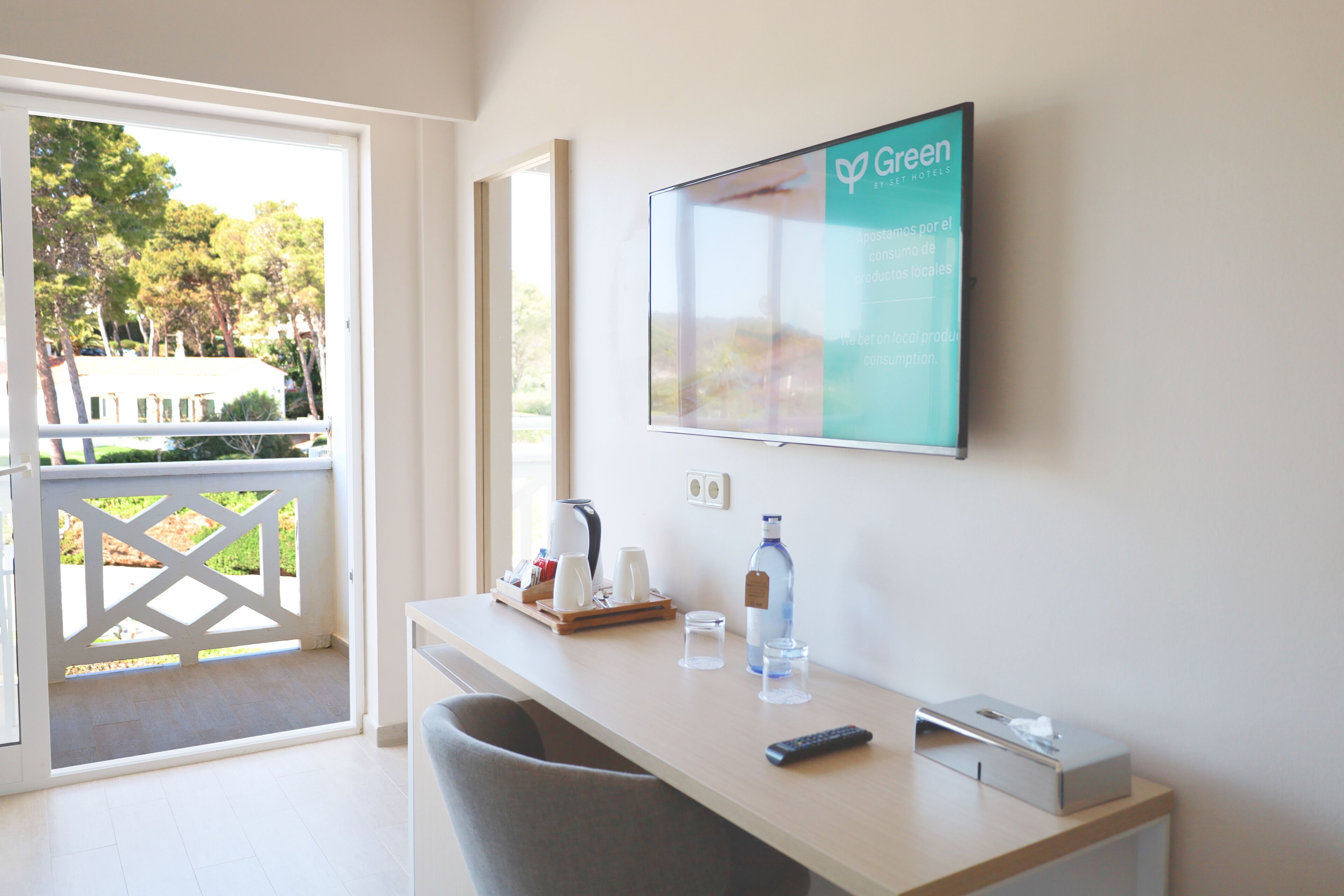 double room, balcony | living area | flat-screen tv