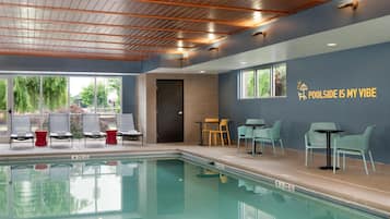 Indoor pool, open 9 AM to 10 PM, pool loungers