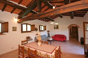 Panoramic Apartment, 2 Bedrooms (Pienza b) | Living area | TV, fireplace - Pienza (Pienza)