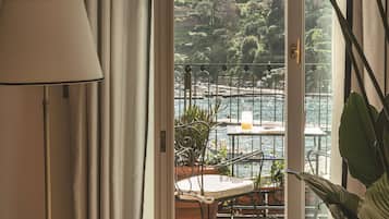 Suite, Balcony, Sea View | Down comforters, minibar, in-room safe, individually furnished