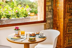 Daily buffet breakfast (EUR 12 per person)