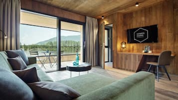 Steghaussuite Deluxe | Oturma alanı | Düz ekran televizyon, ısıtmalı zemin
