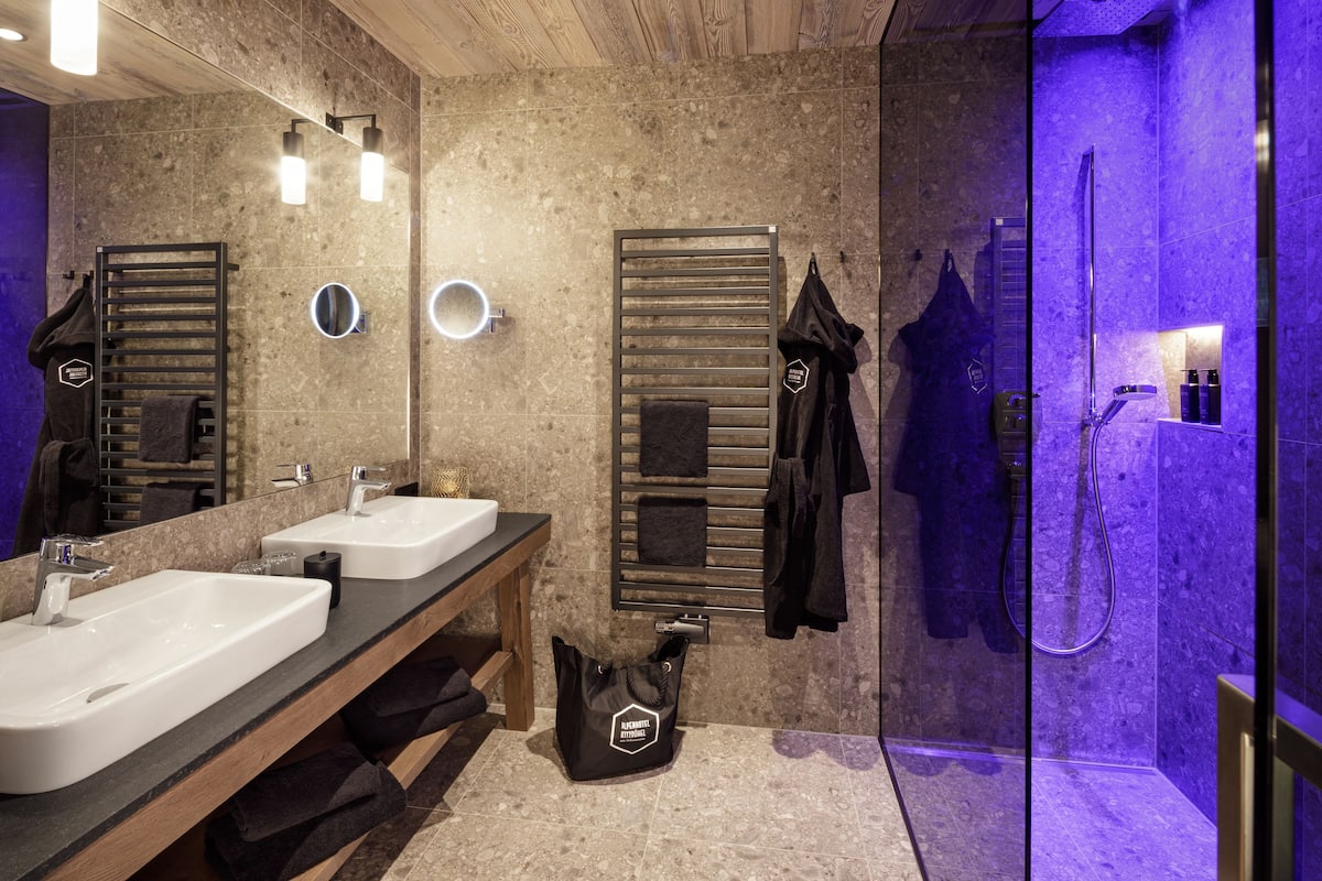 Deluxe Double Room | Bathroom | Rainfall showerhead, eco-friendly toiletries, hair dryer, bathrobes