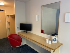 Desk, laptop workspace, iron/ironing board (on request), WiFi (free)