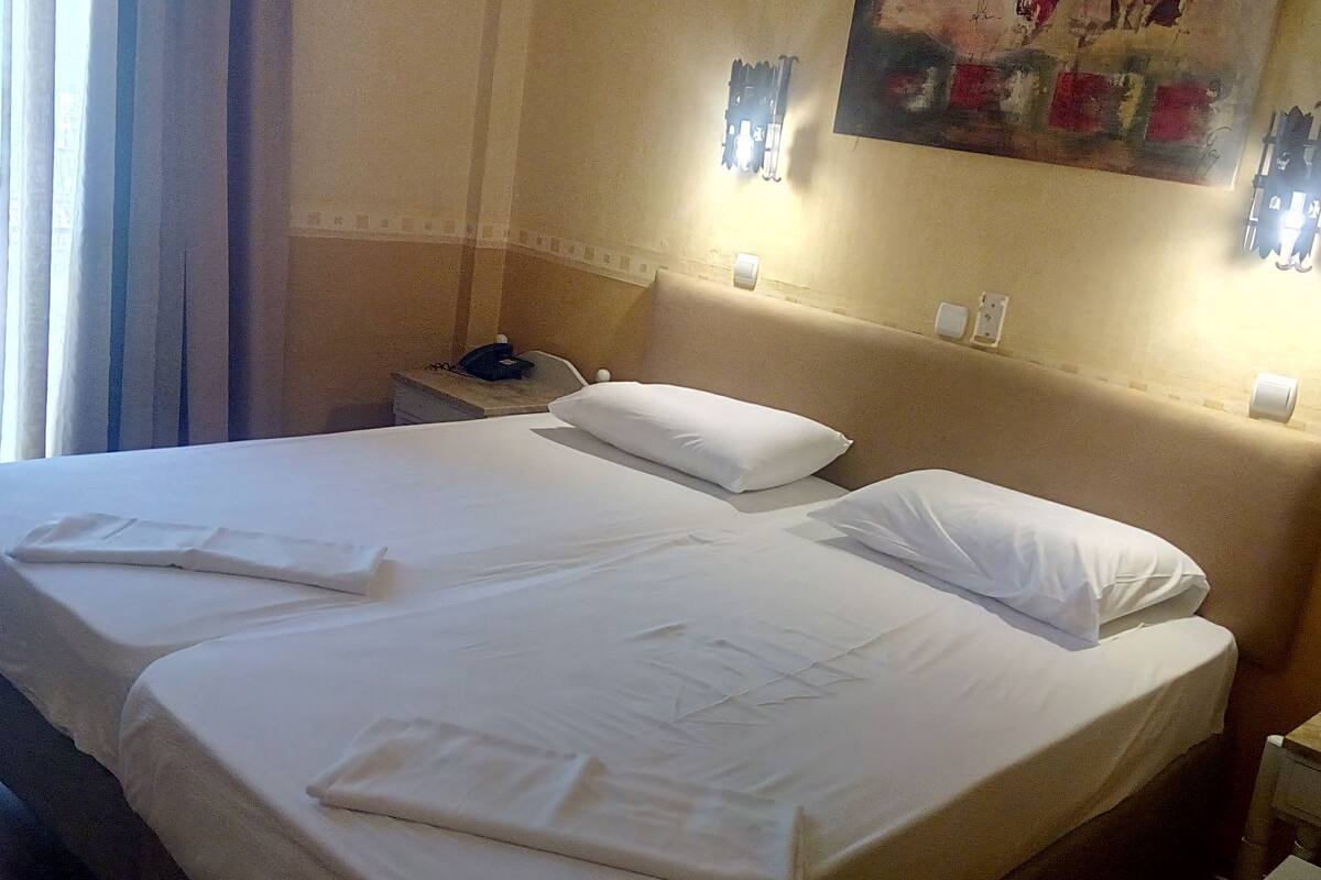 double or twin room, city view | iron/ironing board, free cots/infant beds, free wifi, bed sheets