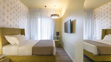 Habitación doble económica | 1 habitación, edredón, minibar y escritorio