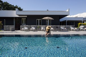 Seasonal outdoor pool, pool umbrellas, pool loungers