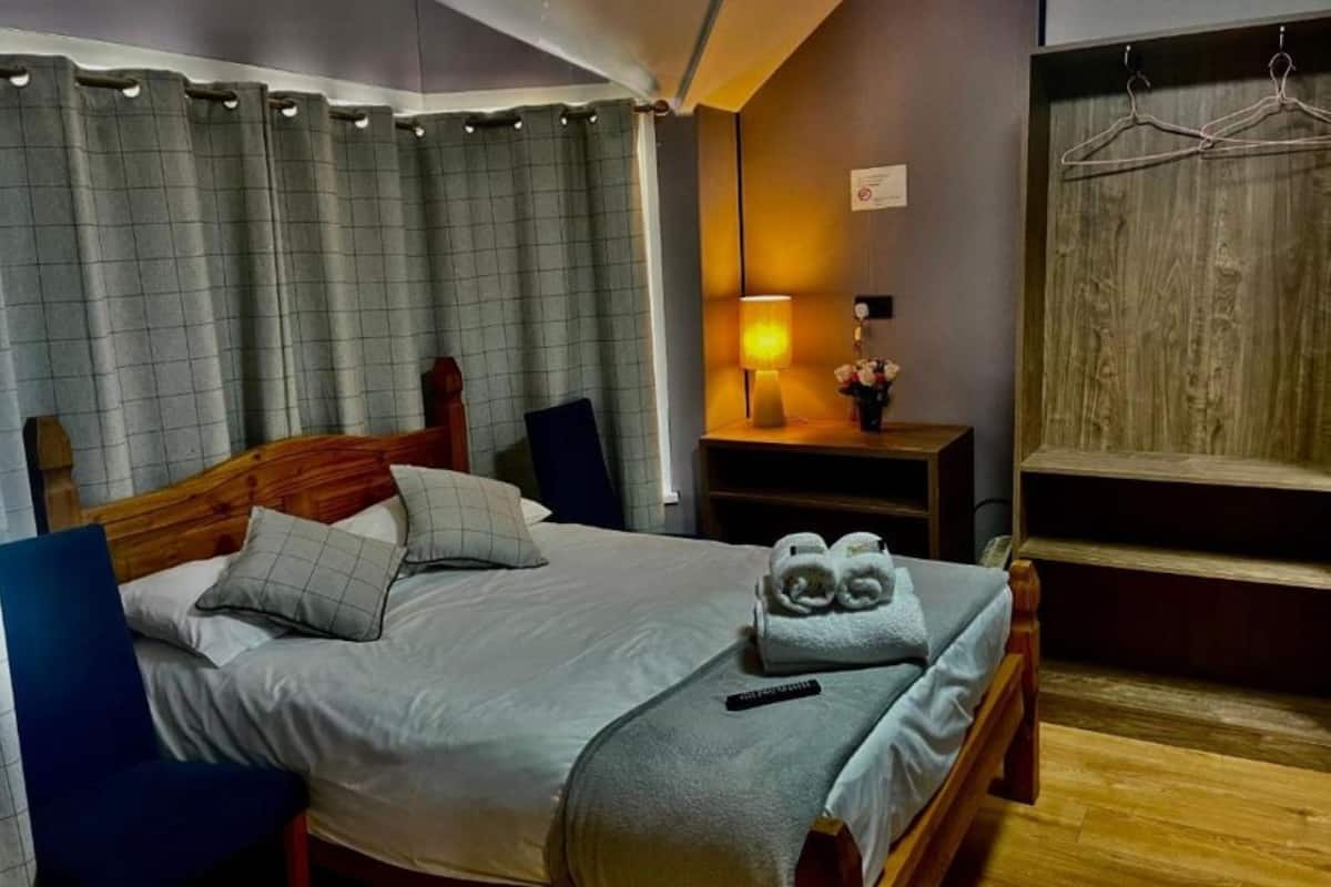 Egyptian cotton sheets, premium bedding, desk, laptop workspace