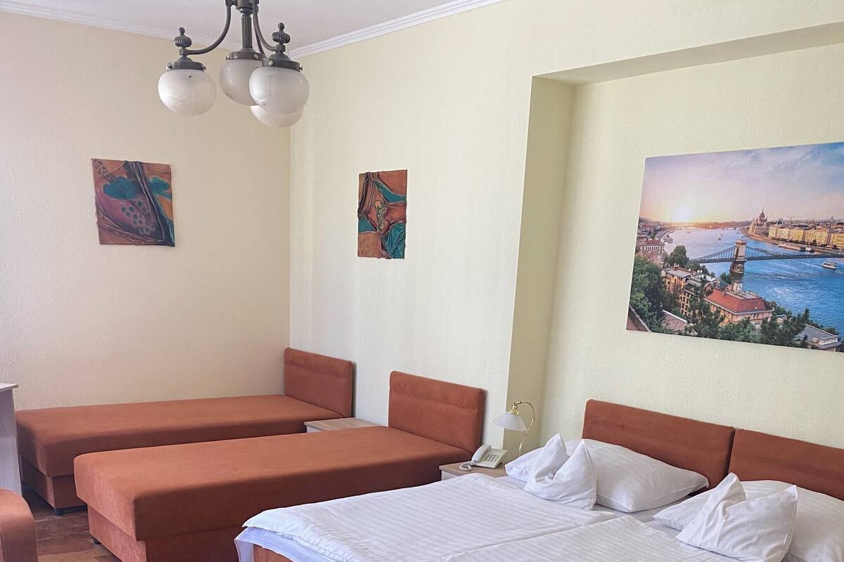 Standard Quadruple Room | Minibar, soundproofing, WiFi (free), bed sheets