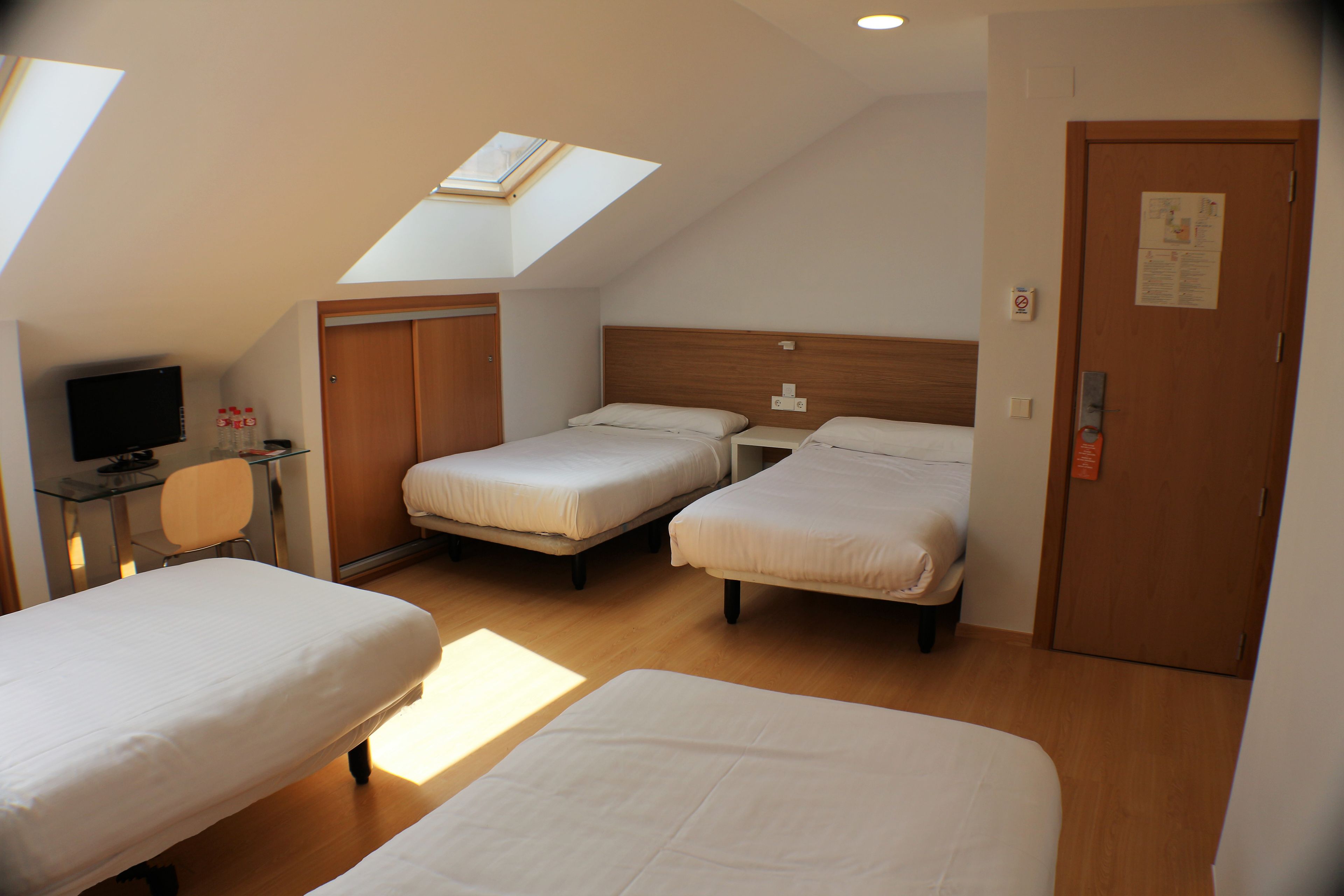 triple room | in-room safe, desk, blackout curtains, soundproofing